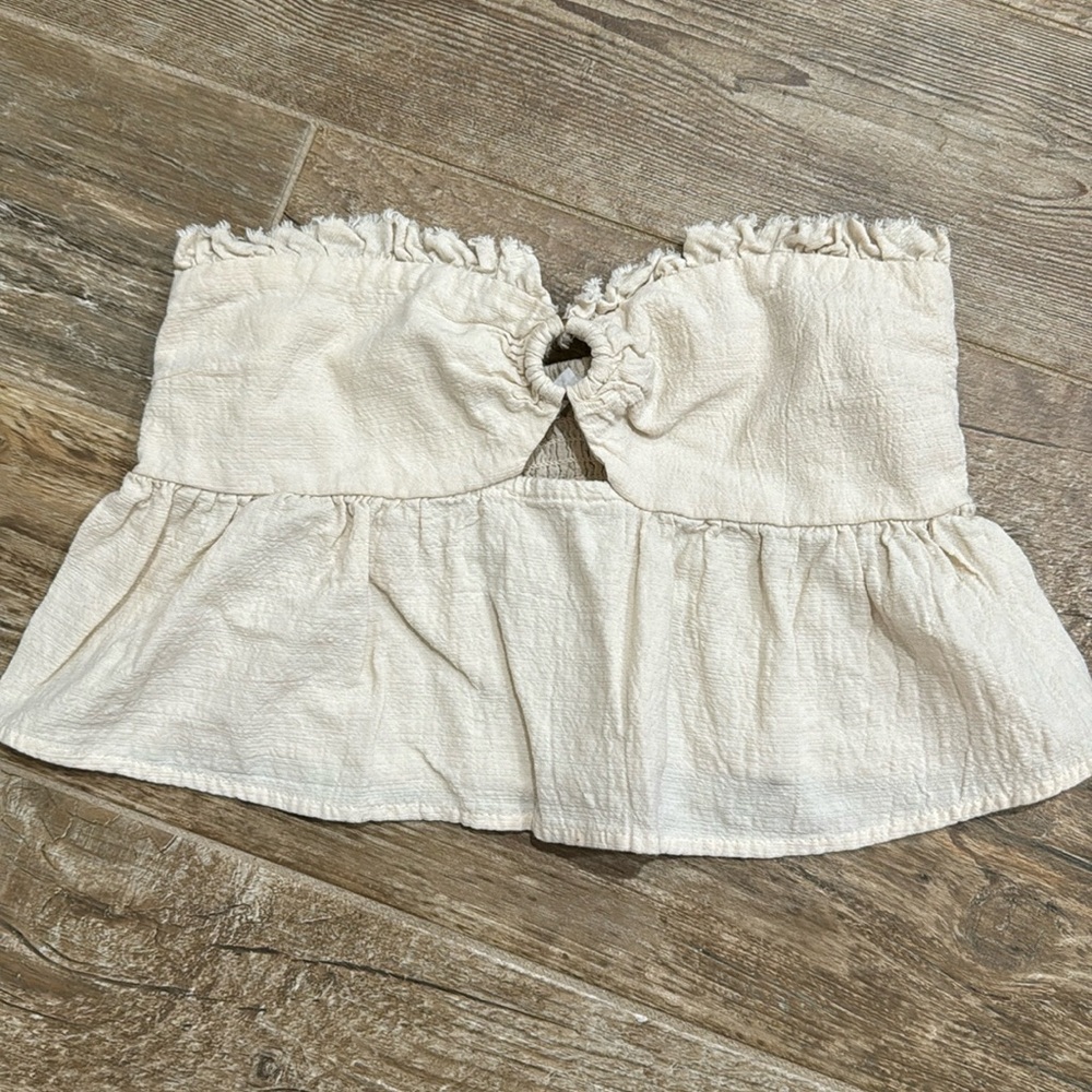 Cream colored strapless crop top. Size xs